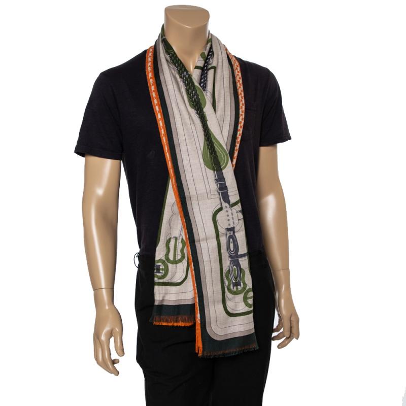 Hermès' talent in creating luxe accessories shines through in this muffler for men. Knit using cashmere and silk, the soft muffler comes in vivid colors. It has a split design of prints—showing the Coaching design and the signature H