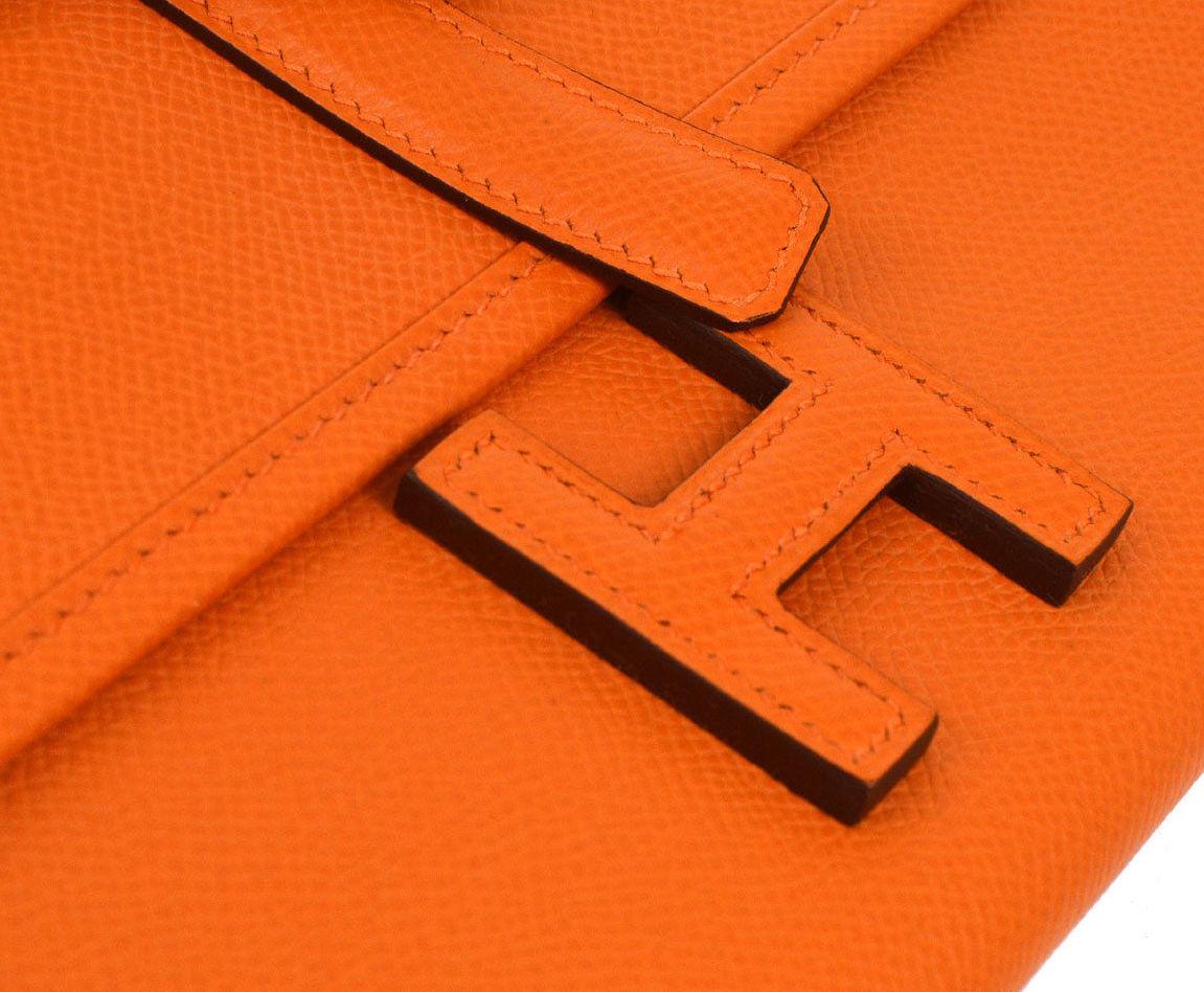 Hermes Orange Leather 'H' Jige Small Mini Logo Evening Clutch Flap Bag

Leather
Leather lining
Slip in buckle closure
Made in France 
Measures 8