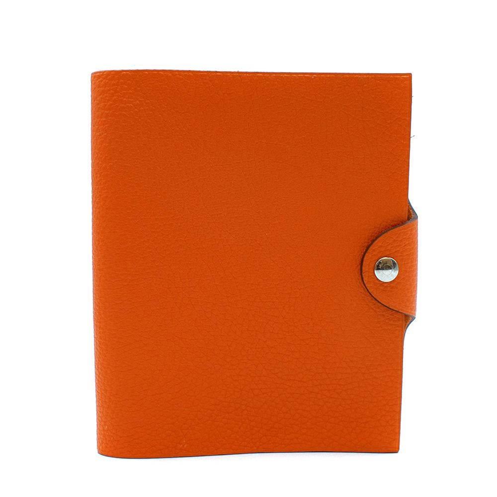 Hermes Orange Leather Small Ulysse Notebook Cover & Refills
-Stunning, soft leather notebook cover
-Two calendar refills included
-Two days per page
-Silver hardware
-Snap fastening
-Boxes included

Materials: Taurillon Clemence Leather

Made in