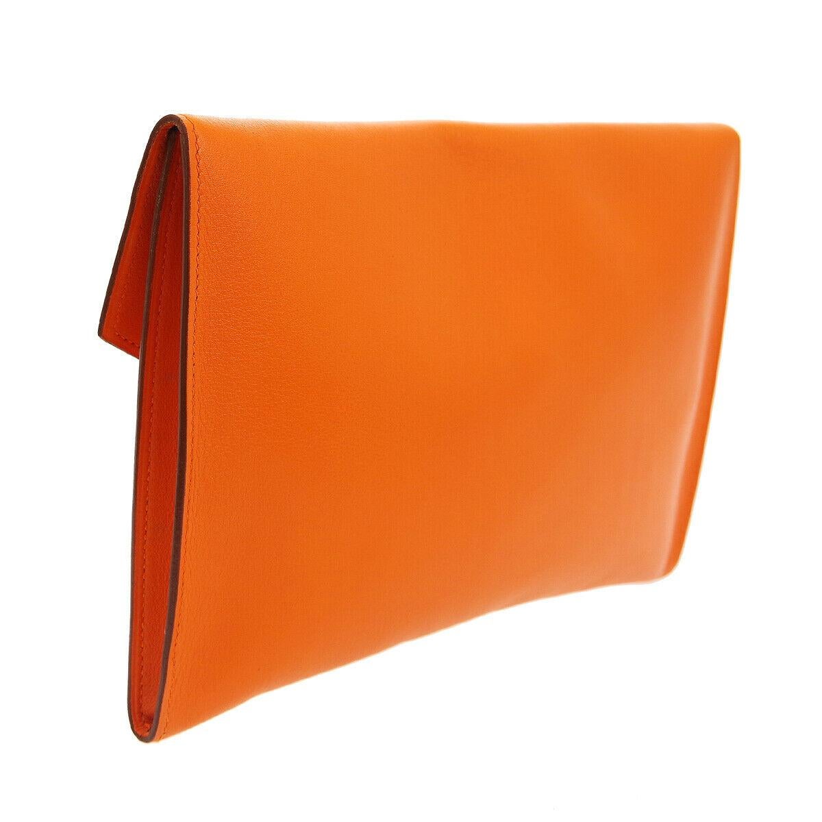 orange leather clutch
