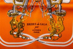 Hermès Orange Mini Silk Pochette Brides Scarf