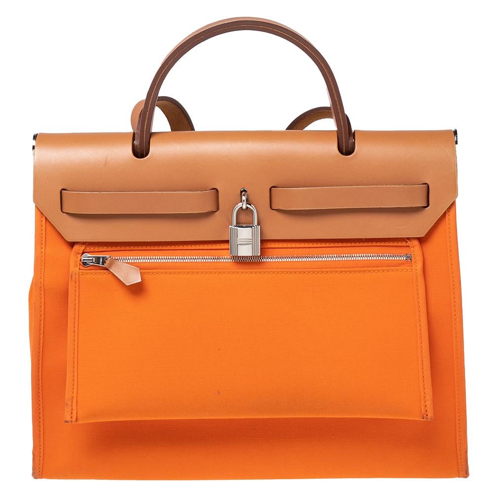 Merged beautifully with signature design, this Herbag Zip PM bag from the House of Hermes remains globally popular. This elegant bag not just highlights your impeccable styling choices but also meets your practical demands. It is crafted using