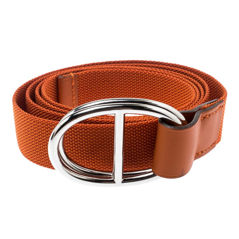 Adding subtlety to your everyday couture from denim to dresses, Hermes brings you a fabulous piece from its wide range of collection. The orange color belt crafted with nylon is skillfully designed for your comfort and style. The silver-tone buckle