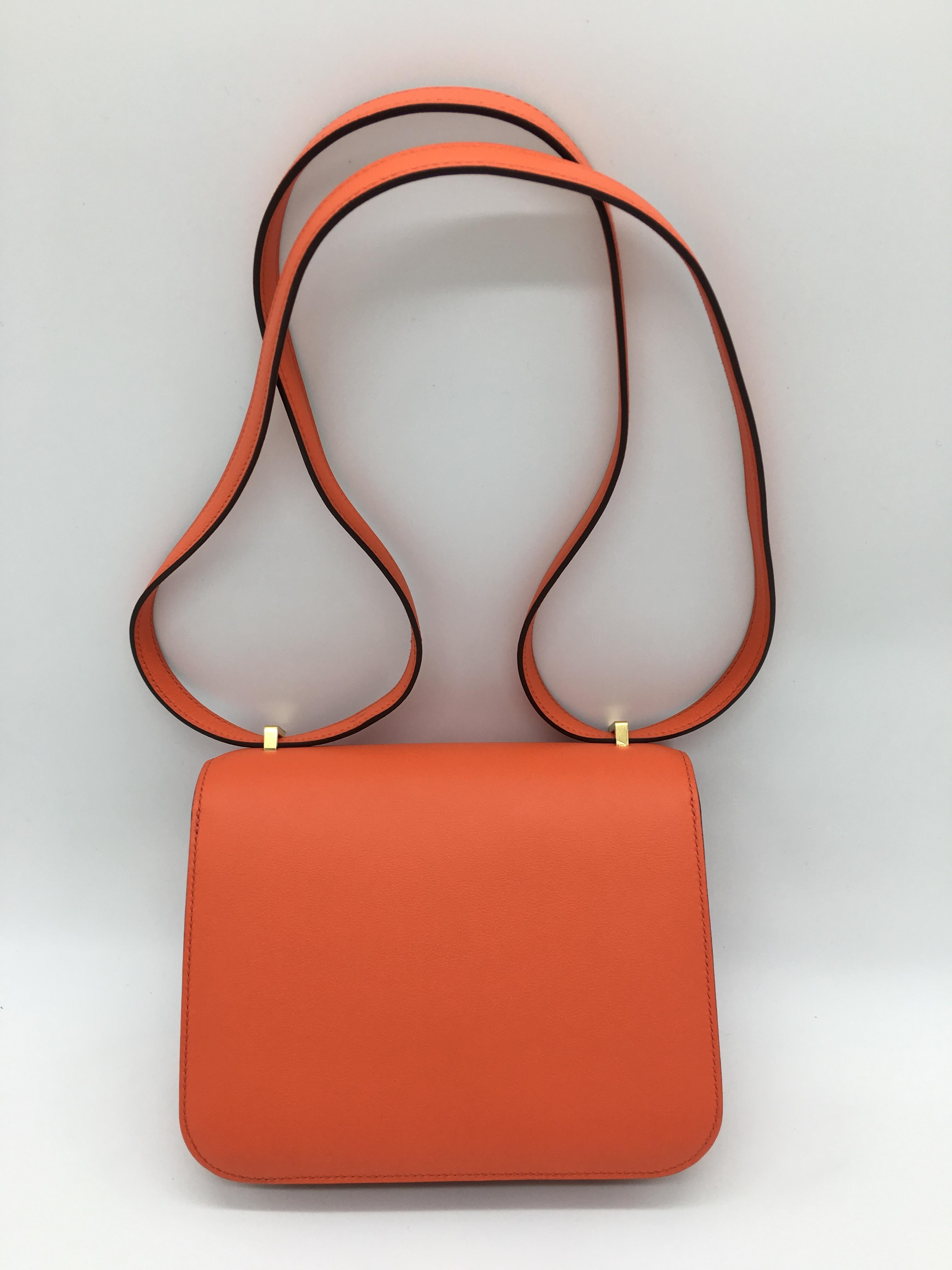 Adapted from the original 1959 Constance design, this scaled down version is a great little bag for evening wear, and in this cheerful Orange Poppy shade is perfect for brightening up any occasion.  This Mini Constance is in Swift Leather with Gold