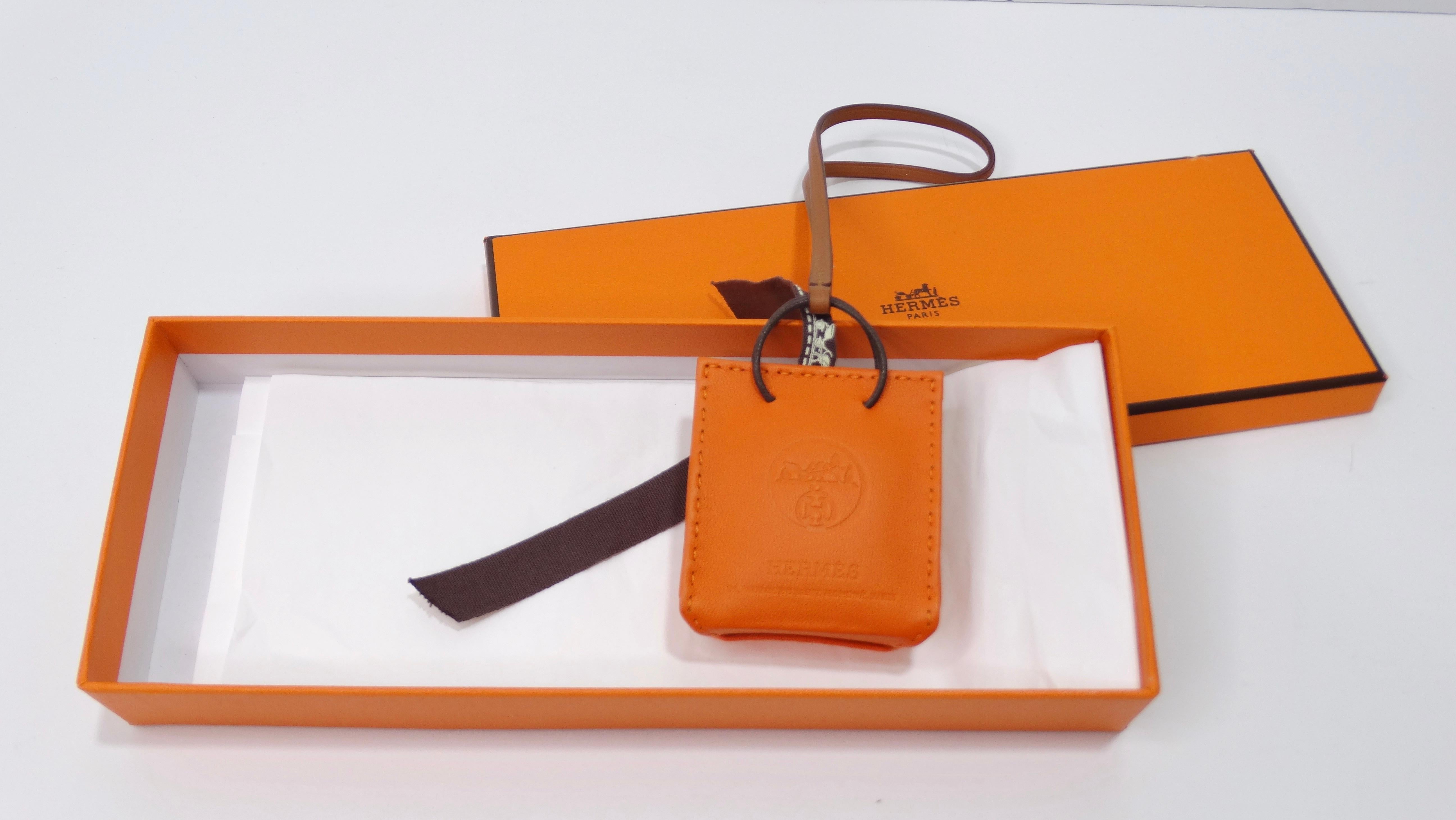 Bring a little flair to your everyday handbag! The key to making fashion effortless is having fun and putting your own unique twist on your ensembles. This is a tiny replica of the Hermes handbag, and will be sure to add a bright touch to your
