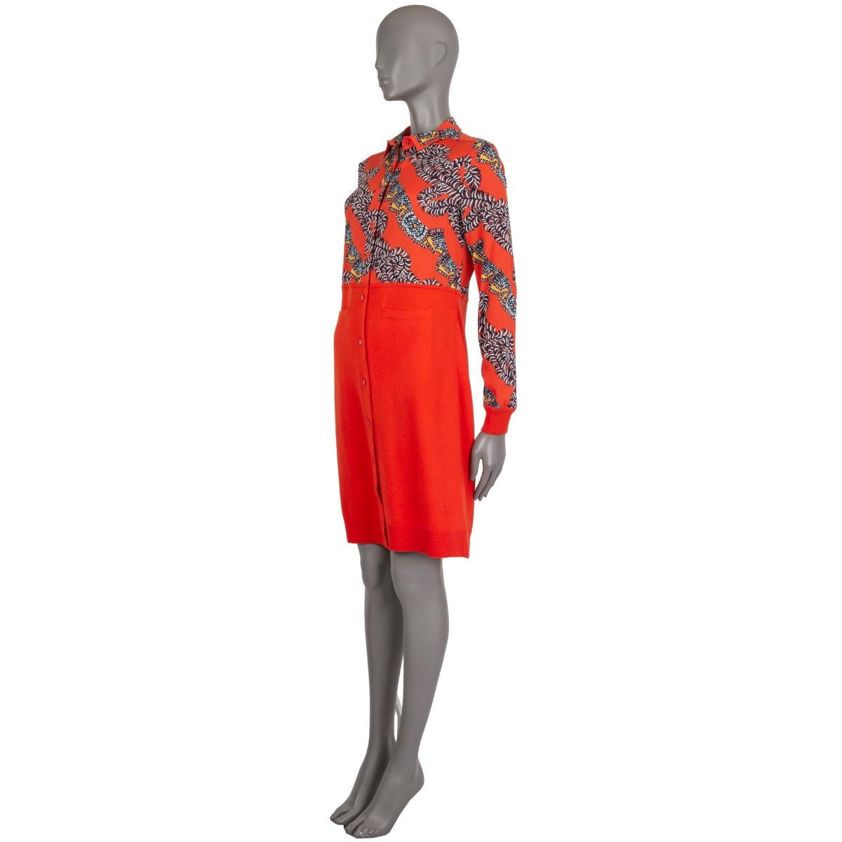 Hermes long-sleeve shirt dress in orange, rapsberry, yellow, baby blue, navy and white silk (98%) and elastane (2%) and orange knit wool (80%) and cashmere (20%). With flat collar, ribbed-knit cuffs and hem, and two pockets on the front sides.