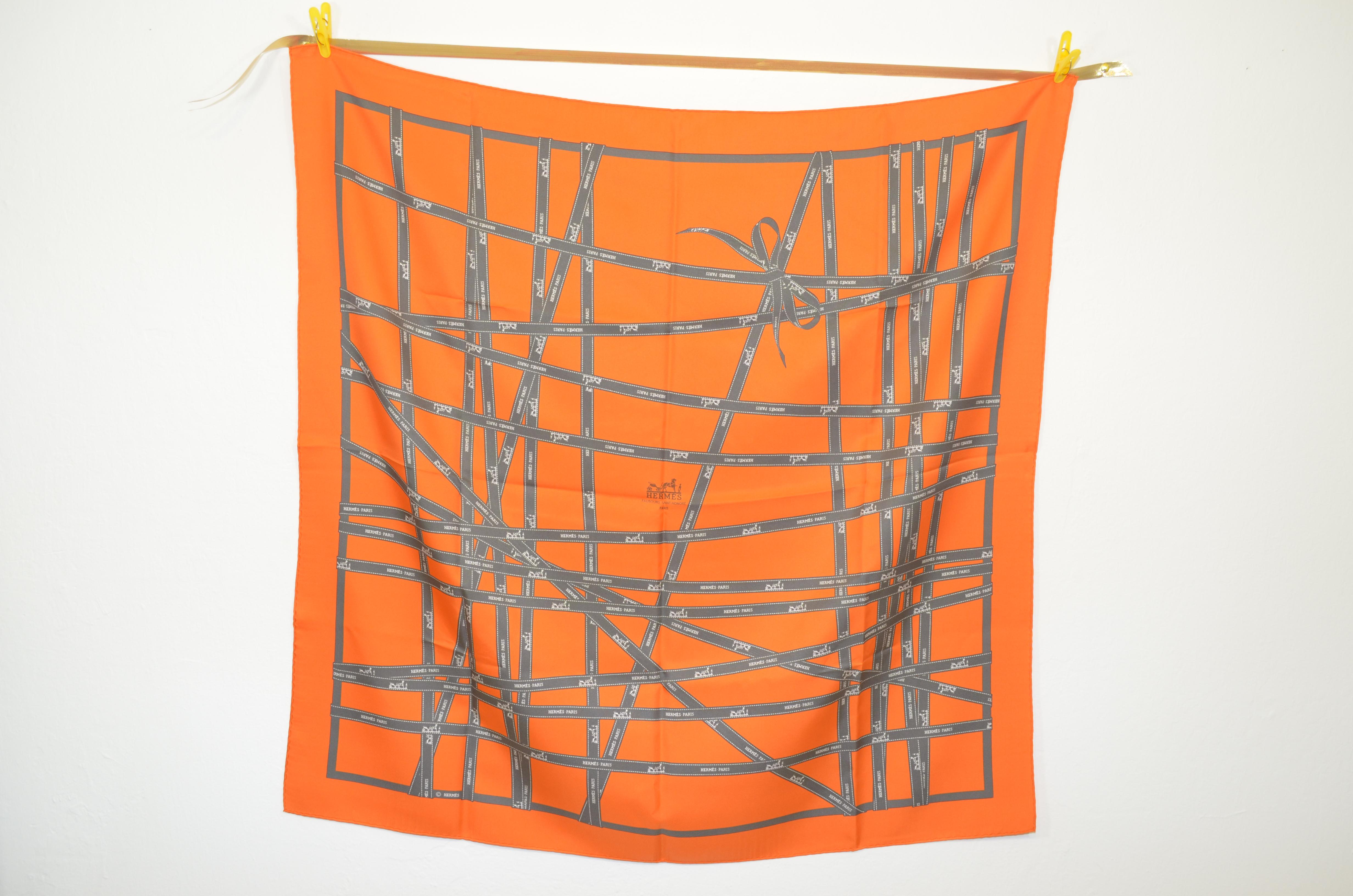 Highly sought after and one of the most recognizable -- This Hermes Paris silk scarf is featured in the Hermes Signature 