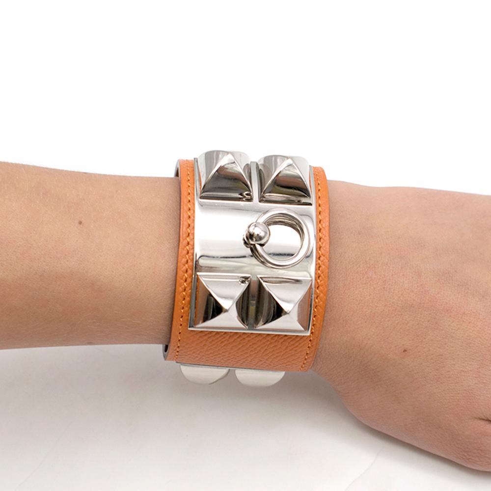 Hermes Orange Swift Collier de Chien CDC Bracelet

- Adjustable fit
- With palladium hardware. 
- Made in France

Please note, these items are pre-owned and may show some signs of storage, even when unworn and unused. This is reflected within the