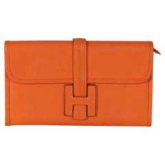 Pochette Hermès Orange Swift Jige Duo