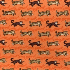 HERMES Cravate en soie imprimée Orange Tigers & Monkeys