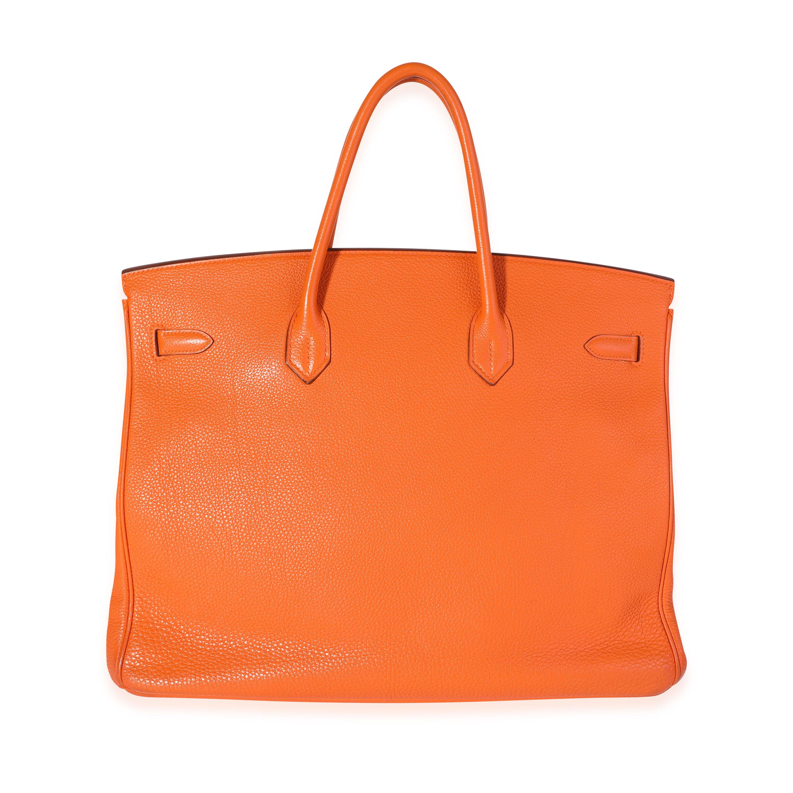 Listing Title: Hermès Orange Togo Birkin 40 PHW
SKU: 119361
Condition: Pre-owned (3000)
Handbag Condition: Very Good
Condition Comments: Very Good Condition. Scuffing to corners and lightly to exterior. Discoloration throughout leather and handles.
