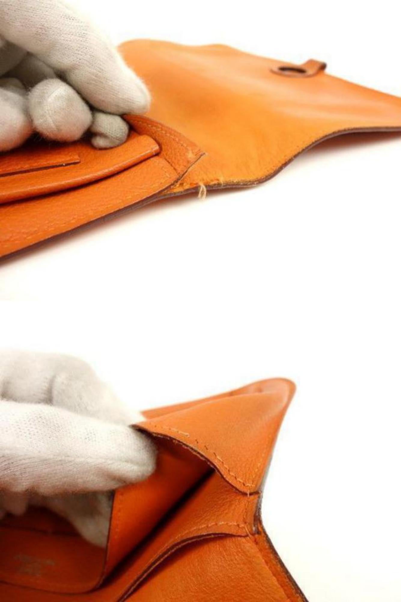 Women's Hermès Orange Togo Leather Dogon Wallet 232H857 For Sale