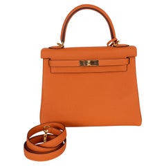 HERMES orange Togoleder KELLY 35 REOUTNE Tasche mit Gold