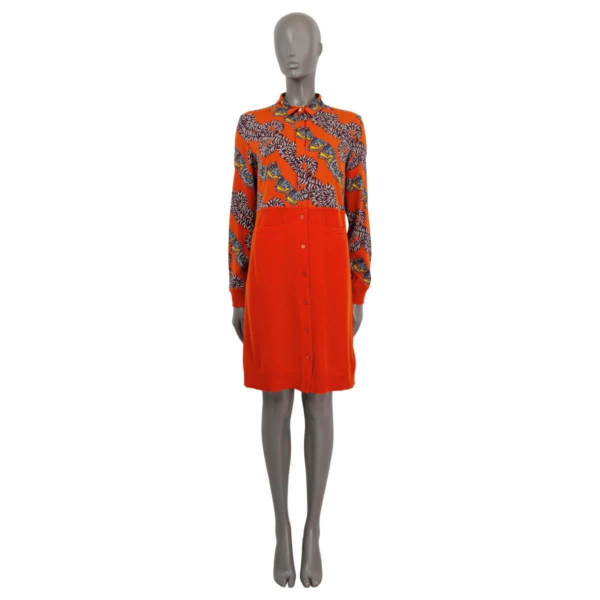100% authentic Hermès Pre-Fall 2018 long sleeve shirt dress in orange, navy, yellow, burgundy, light blue and off-white silk (94%), elastane (6%) and the knit parts in orange wool (80%) and cashmere (20%). Opens with buttons on the front. Unlined.
