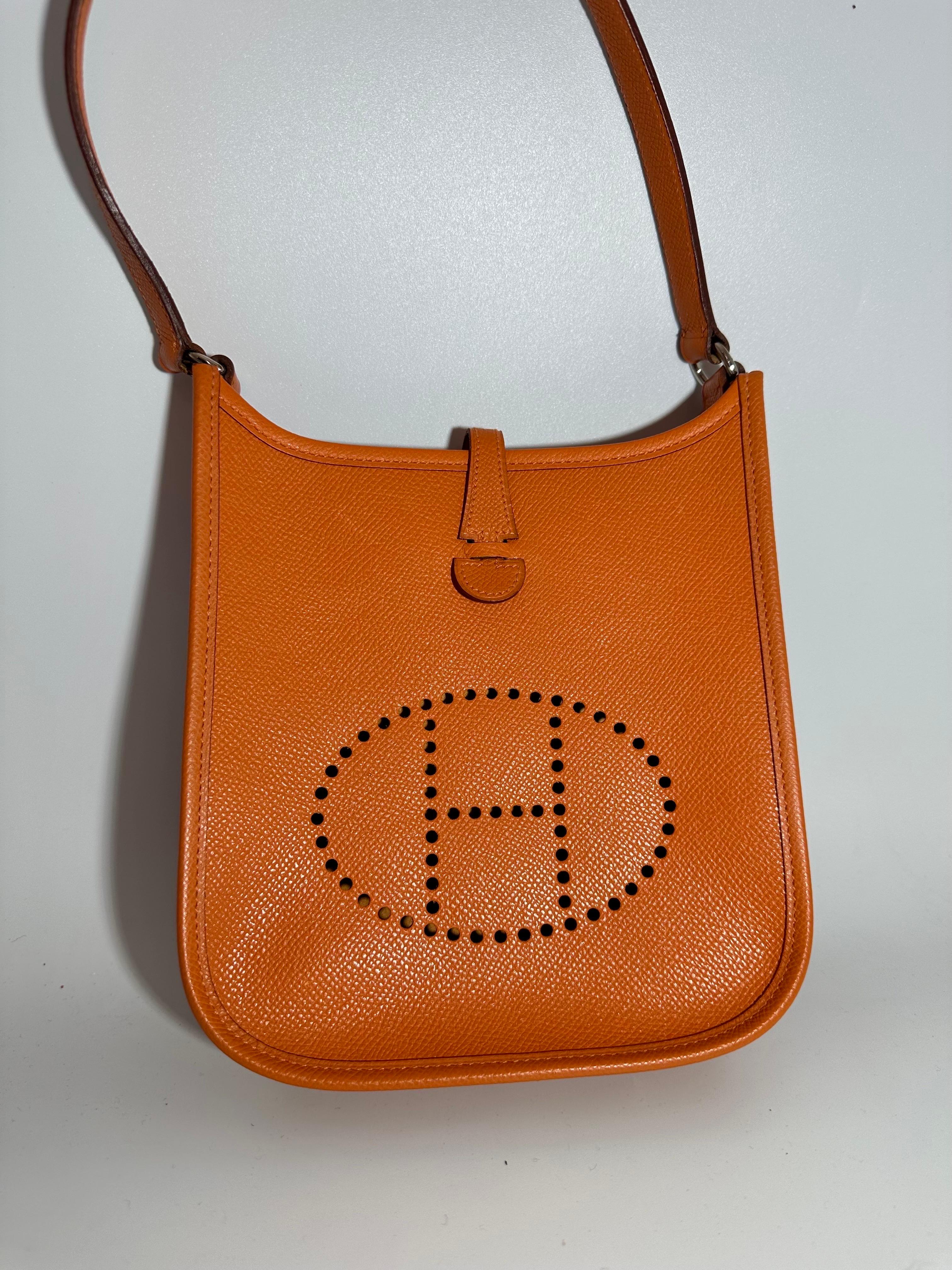 Hermès  Oranges Leather Small MINI Bag, Excellent condition like new
Small bags are more expensive then big Hermes bag.
Most desirable and Convenient Mini bag and most desirable color Orange
 Measurements: Height 7