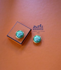 HERMÈS - Orecchini vintage matallo placcato oro e smalto, motivo Carrè " Cosmos"