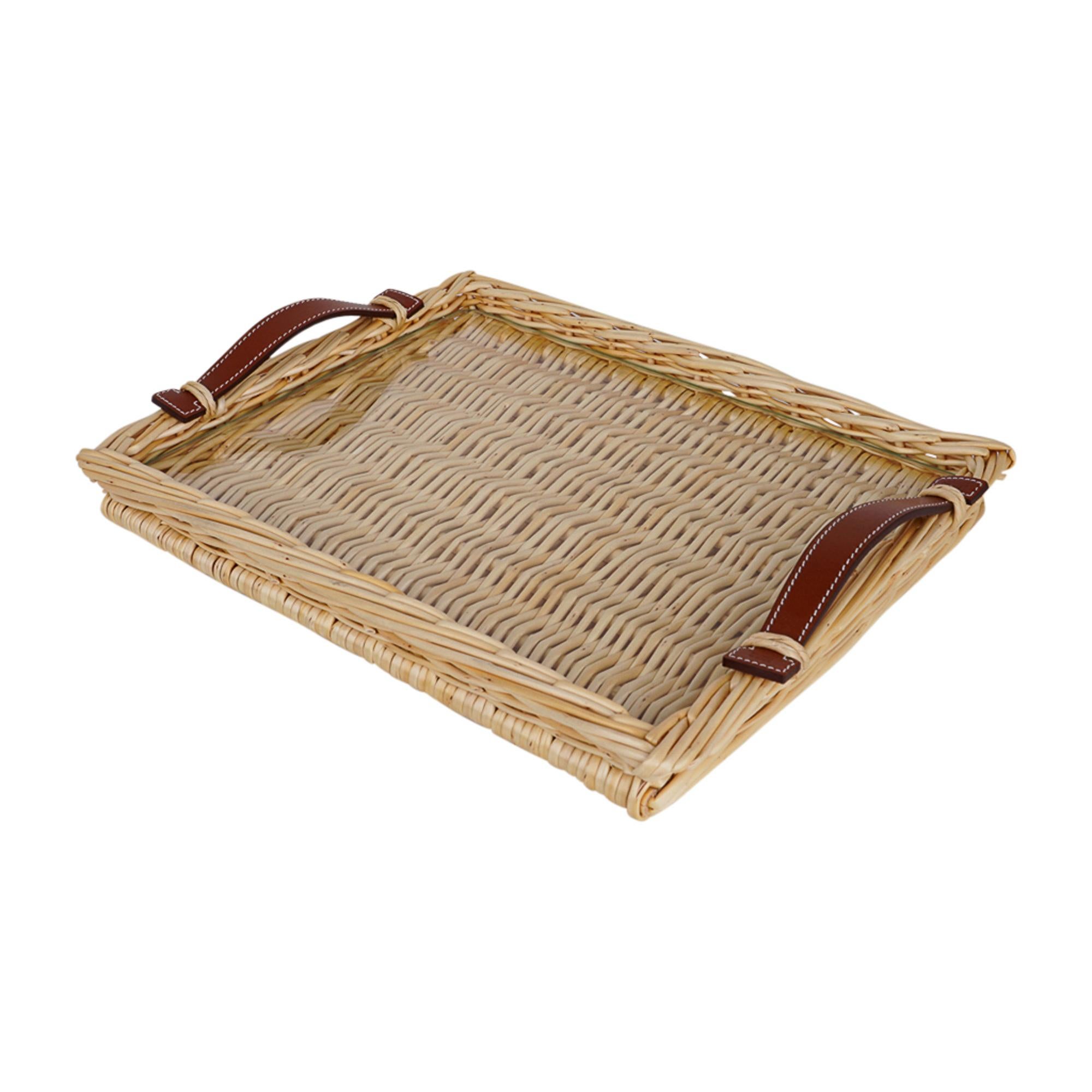 Mightychic offers a guaranteed authentic Hermes Oseraie Very, Very Small Model Rectangular serving tray with coveted Bridle leather handles.
Fitted glass interior.
Leather has signature Hermes stamp.
Timeless piece also makes for a special gift