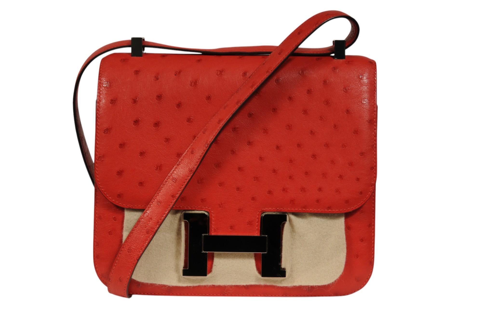 - Burnt orange red ostrich leather exterior

- Silver Palladium hardware

- Exterior Patch pocket

- Comes with dustbag

 

Condition: 

The bag is in overall great condition with no major imperfections, has small crease mark on the interior please