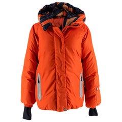 Hermes Manteau Oversize Orange Puffer Coat avec capuche et doublure imprimé foulard - Taille US 8