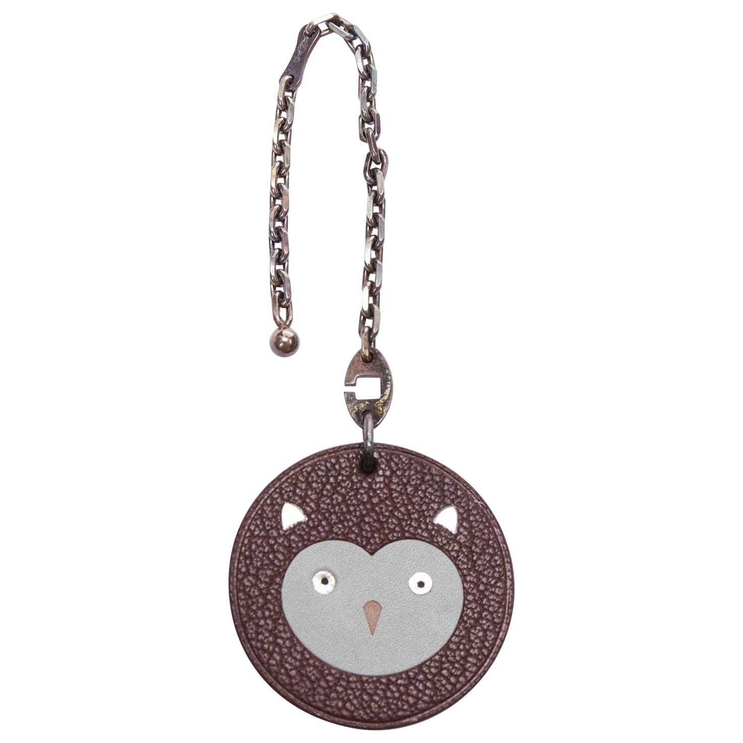 HERMES Owl brown textured leather cartoon round palladium charm
