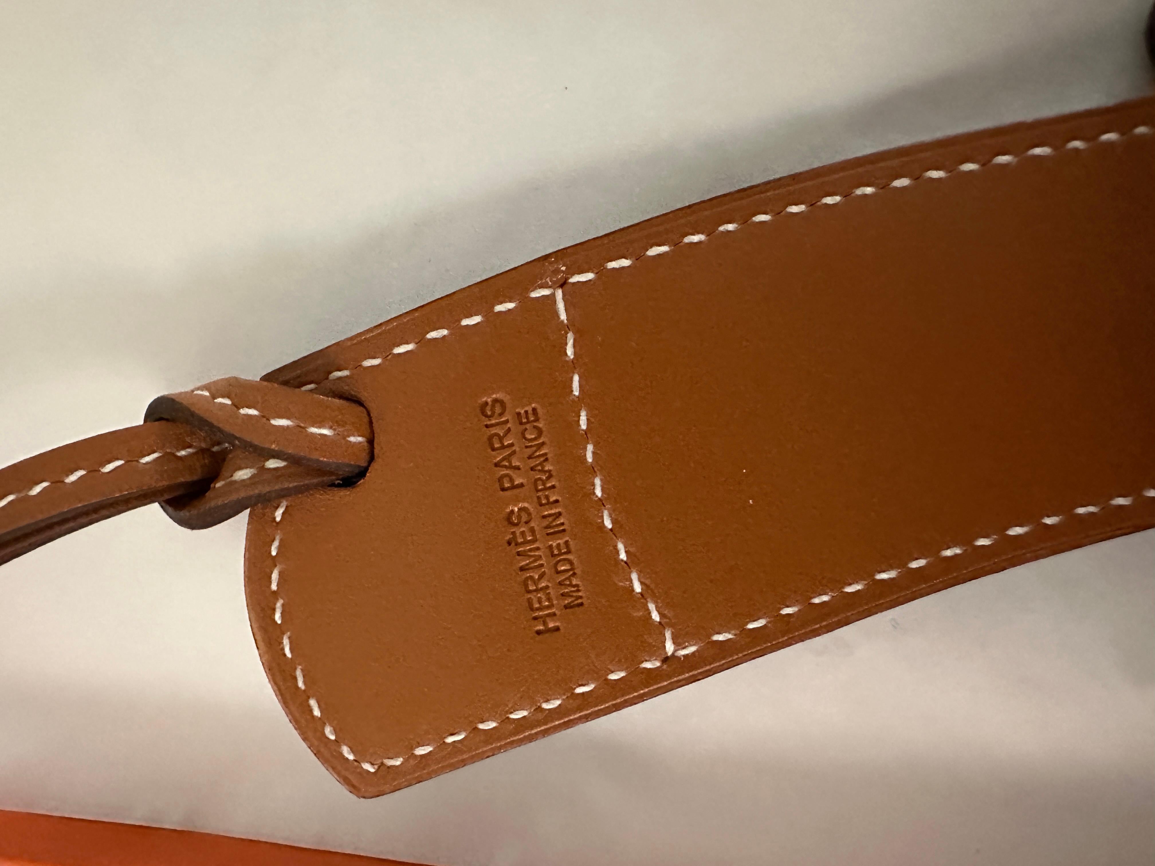 The Paddock Boot Charm
HERMES PADDOCK LEATHER BOOT CHARM
Naturel / Sable / Bleu 
How cute is this!
Equestrian Boot charm in Butler and Swift calfskin with palladium plated buckle
Comes in Hermes Box tissue and ribbon
Retail is $820 plus tax

Think