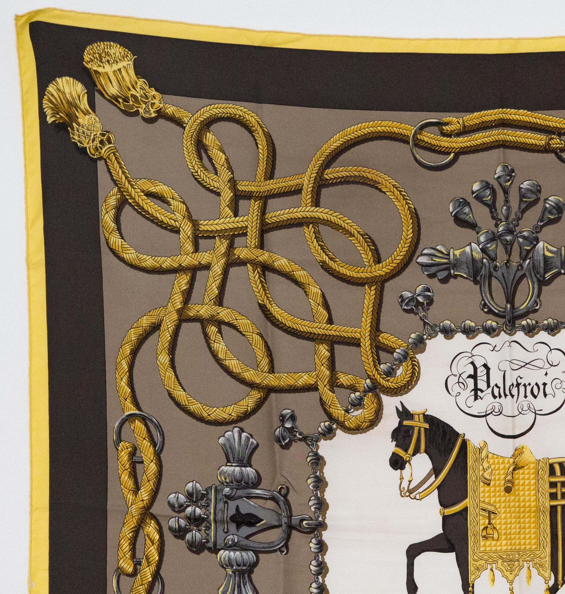 Hermes silk scarf Palefroi by Francoise de la Perriere featuring a brown border, a horse scene.
In excellent vintage condition. Made in France.
First issue: 1965s
35,4in. (90cm)  X 35,4in. (90cm)
We guarantee you will receive this  iconic item as