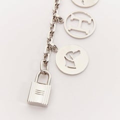 HERMES Palladium Breloque Olga Cadena lock H logo horse dog coin bag charm chain