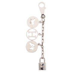 HERMES Palladium Breloque Olga Cadena lock H logo horse dog coin bag charm chain
