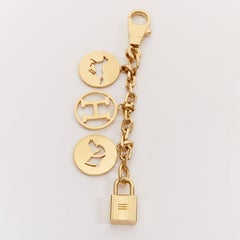 HERMES Palladium Gold Olga Cadena lock H logo horse dog coin bag charm chain