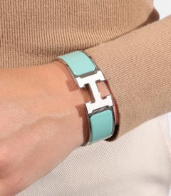 Pulsera Clic Clac H Hermès Lagon y PM blanca chapada en paladio