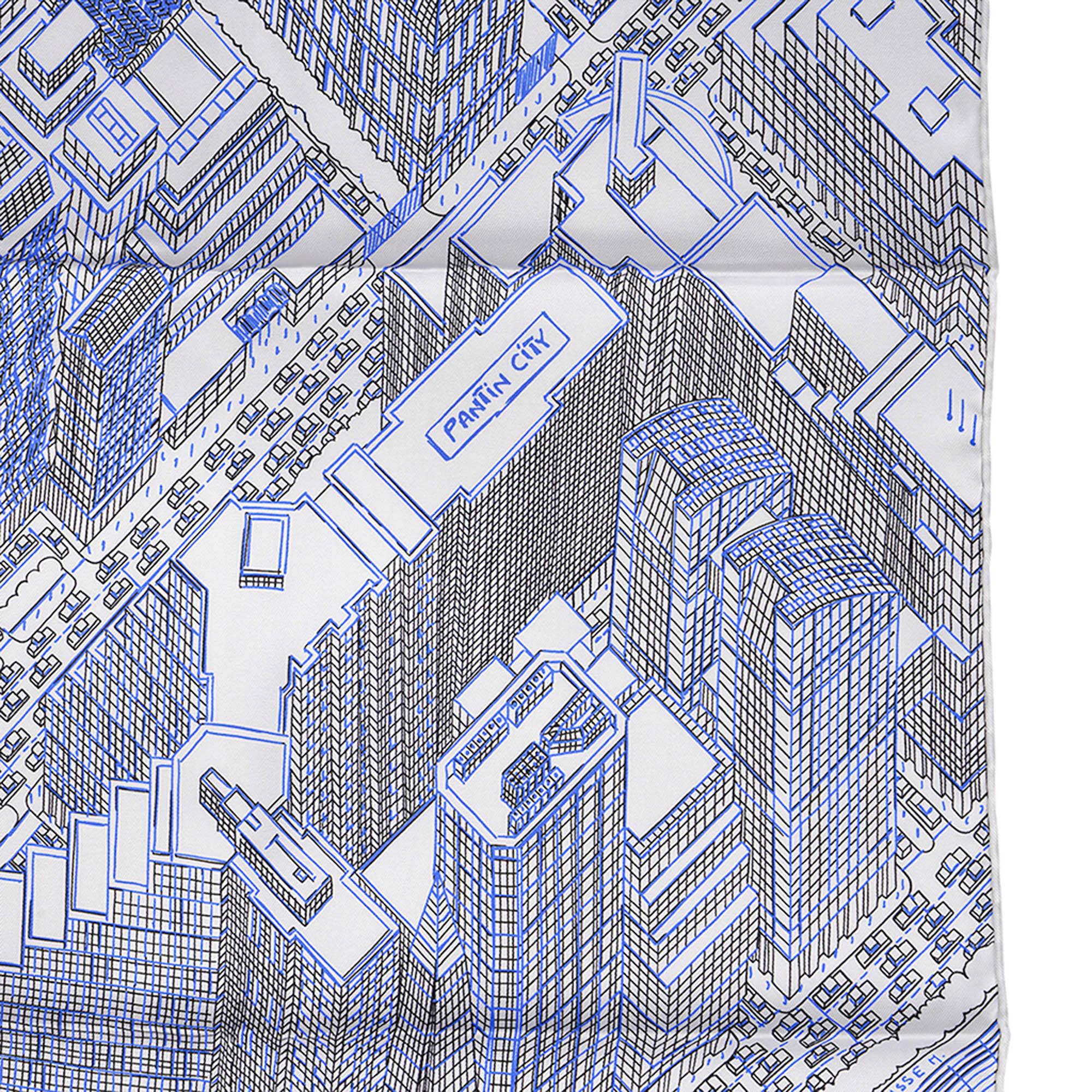 Mightychic offers an Hermes Pantin City silk twill scarf.
Featured in Blanc, Bleu and Noir colorway.
Depicts an aerial view of Pantin City, a suburb of Paris.
Designed by Mamadou Cisse.
Hand rolled edge.
Comes with Signature Hermes box and