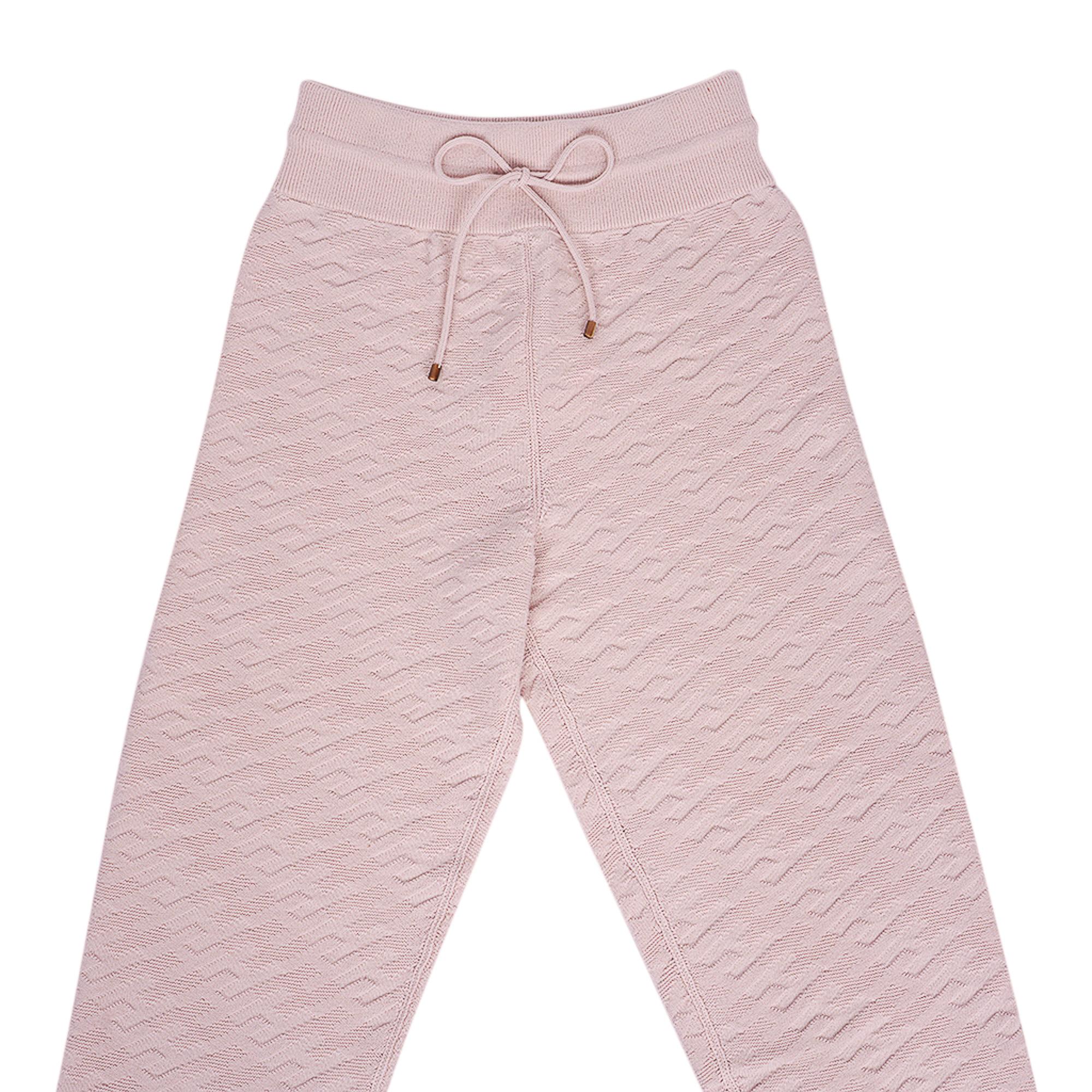 Mightychic offers an Hermes Jogging Pant featured in Rose Petale
Loungewear Voyage wool knit in the palest rose with embossed H throughout.
Drawstring waist.
Horn tipped cord.
Made in Italy.
Has matching sweater - this listing is only for the