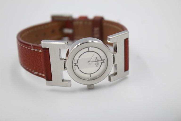 Hermès Paprika watch with a brown leather strap. at 1stDibs