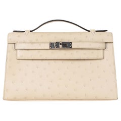 HERMES Parchemin cream OSTRICH KELLY POCHETTE Bag Phw
