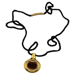 HERMÈS, collier pendentif bouteille vintage parfums