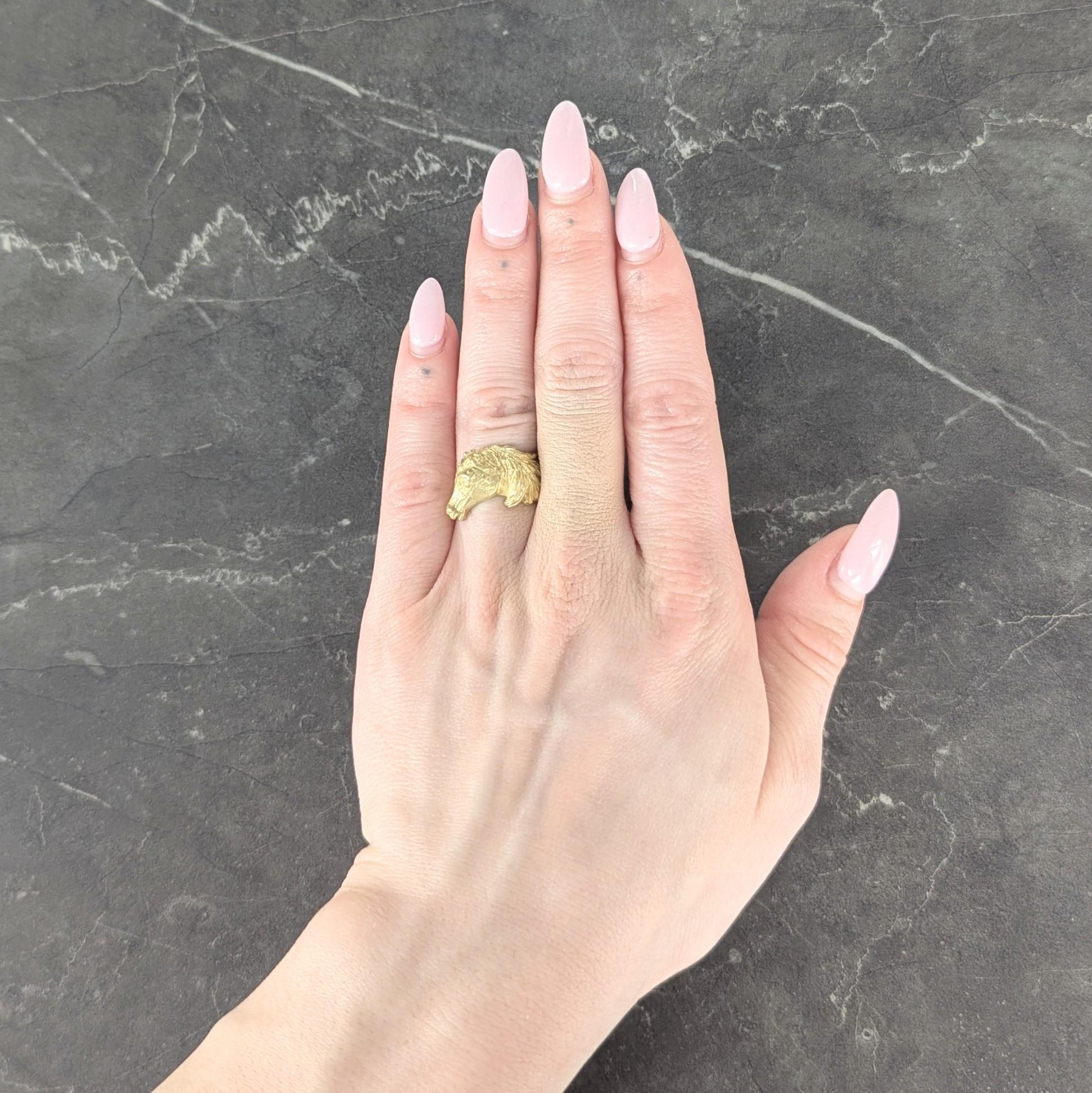 Ring designed as stylized horse head with a flowing mane wrapping fully around
Engraved with hair texture and grooved with facial features
Completed by matte gold finish
Stamped with French hallmarks for 18 karat gold
Fully signed for Hermès