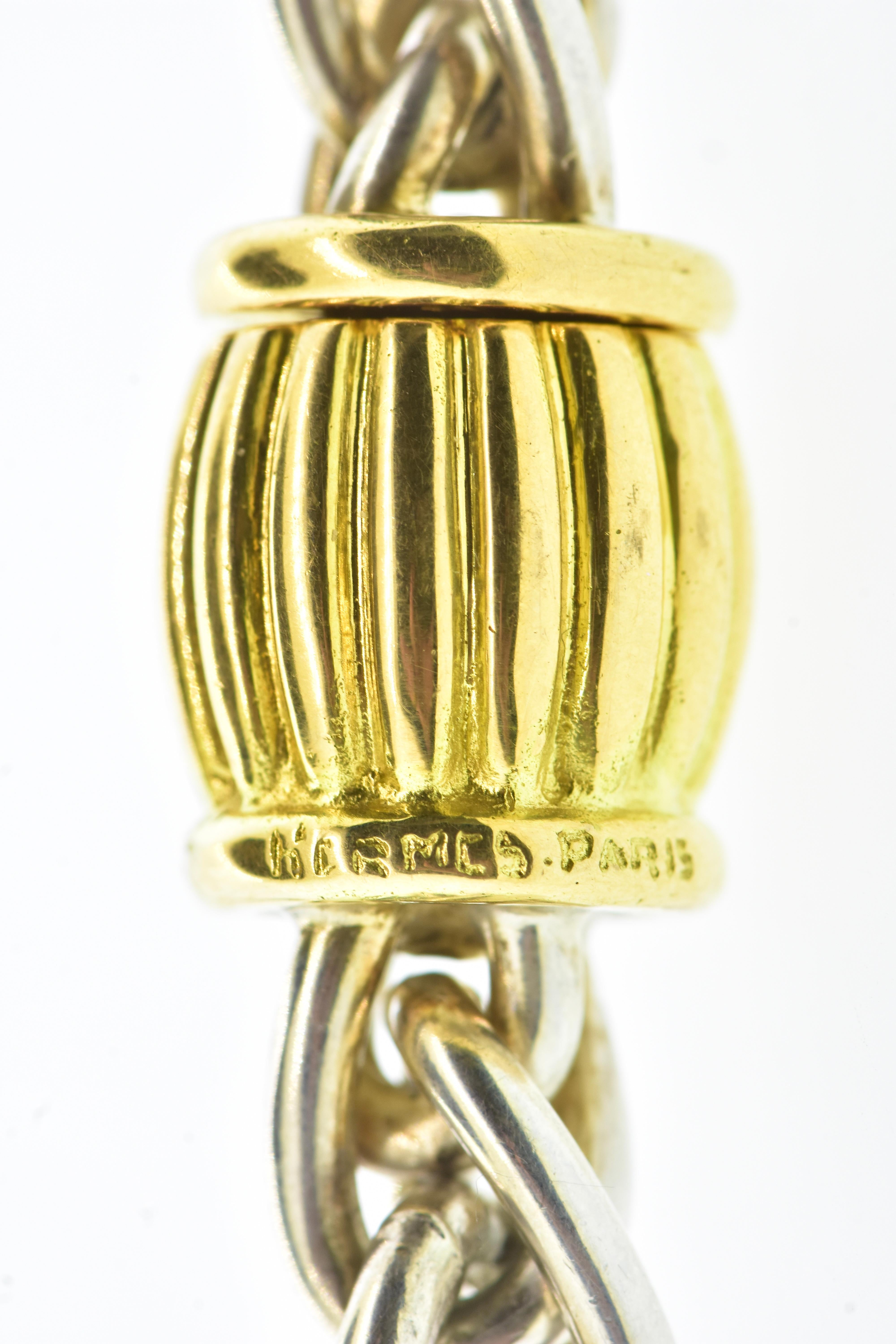 Halskette aus 18 Karat Gelbgold und Sterlingsilber von Hermès Paris, um 1995. für Damen oder Herren im Angebot