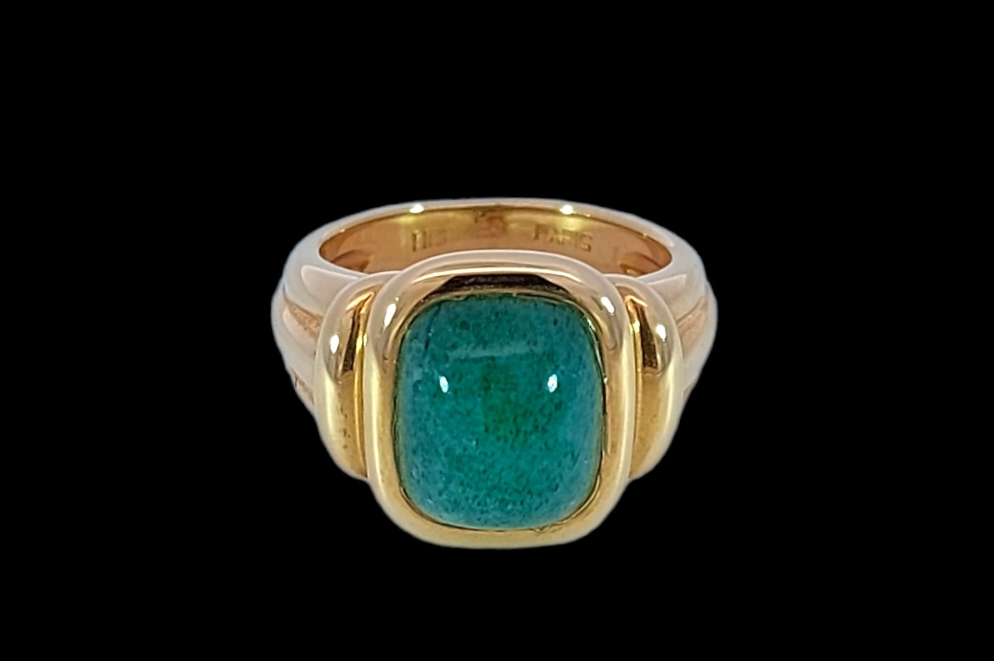 Hermès Paris 18kt Yellow Gold Ring with Cabochon Jade Stone

Jade: Green Cabochon Jade stone 9.1 mm x 11.5 mm

Material: 18kt Yellow gold

Ring size: 52 EU / 6 US ( Can be resized for free)

Total weight: 12.4 gram / 0.440 oz / 8 dwt