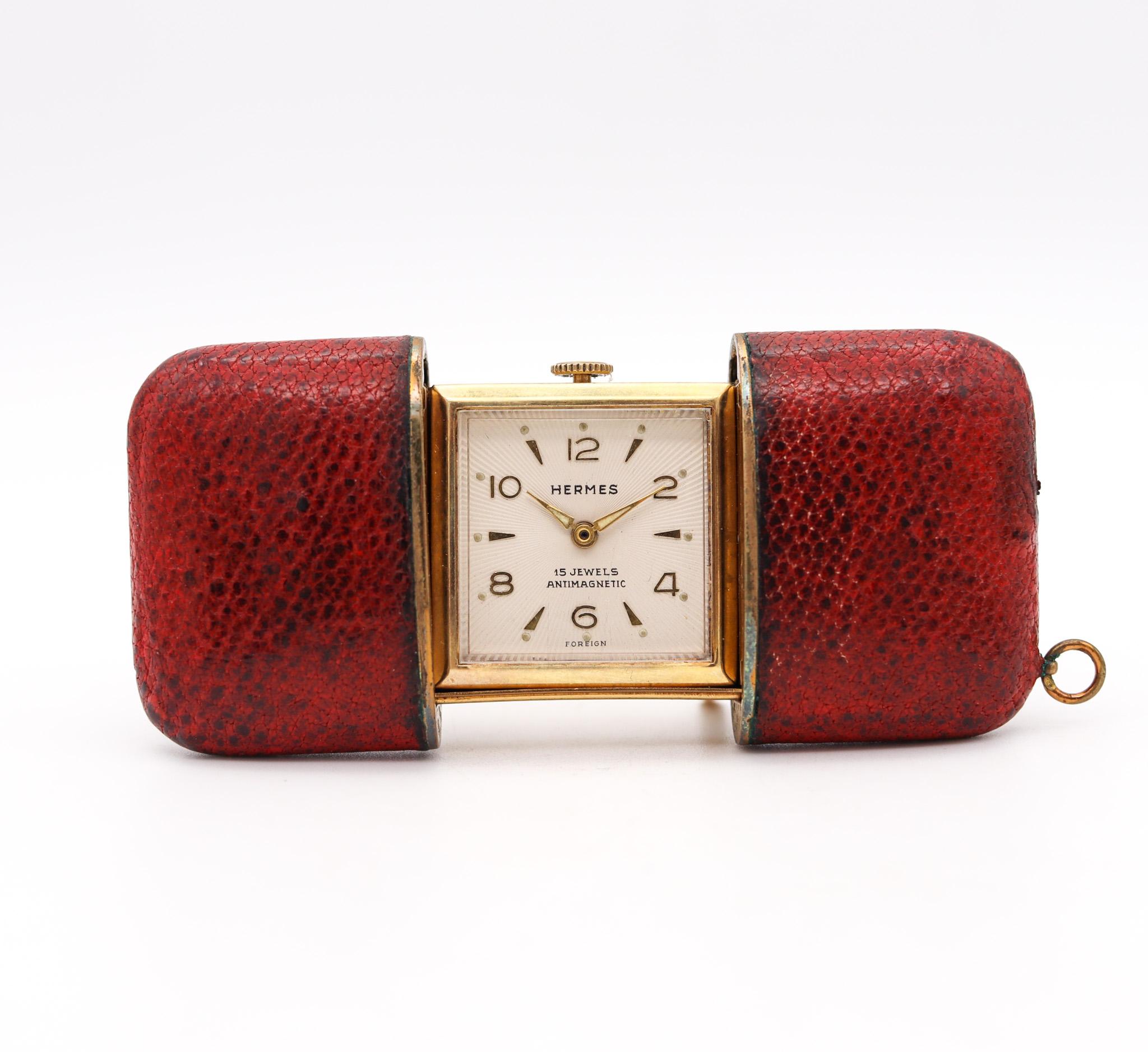 An ermeto travel purse clock designed by Hermes.

A beautiful and rare travel purse clock, created in Paris France by the luxury house of Hermes during the mid century period, back in the 1950-1960. This ermeto clock was crafted in solid gilt