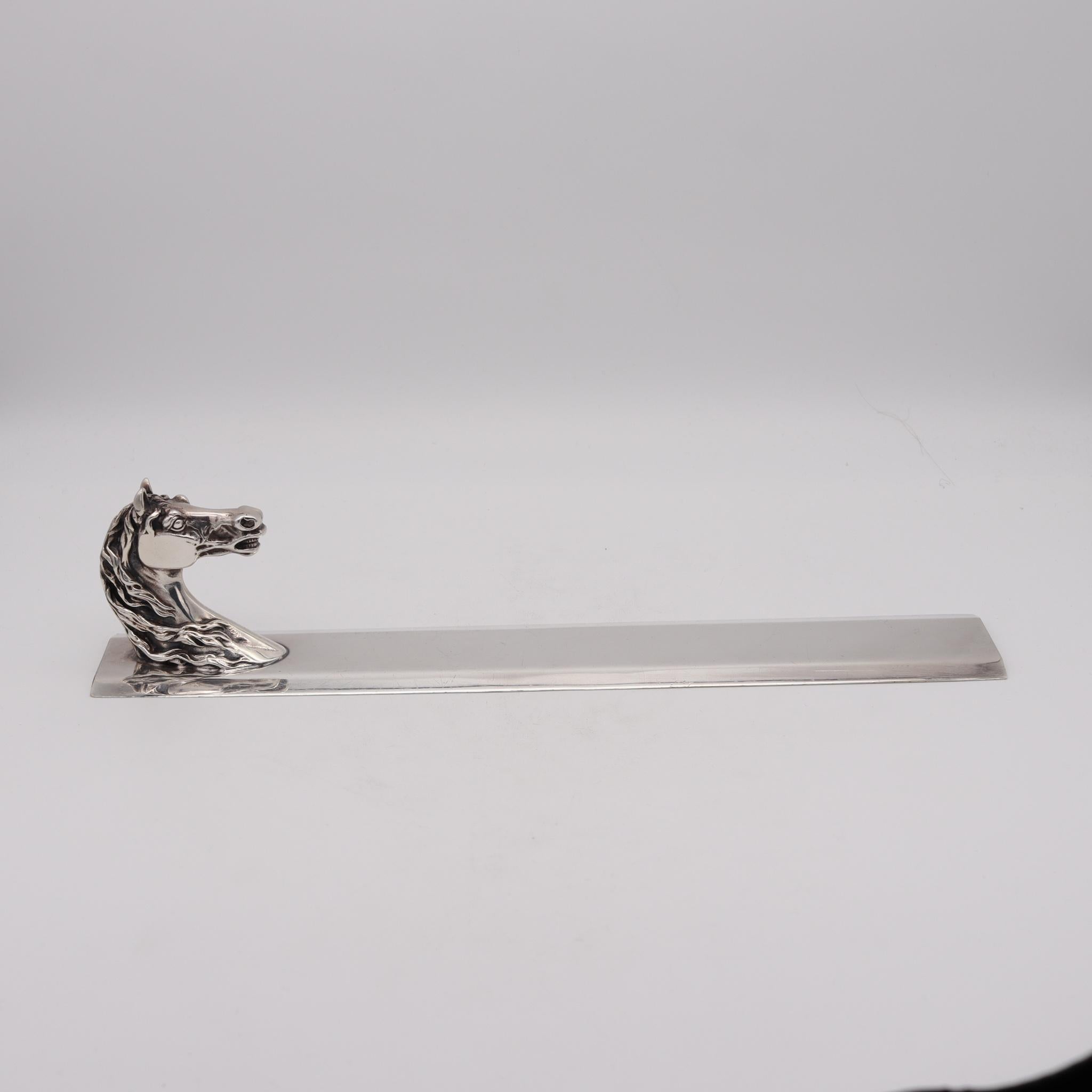 Desk paper weight letter opener set designed by Hermes.

Fabulous and highly decorative piece, created in Paris, France by the house of Hermes, back in the 1960. This useful horse-profile paper weight and letter opener is very rare and has been