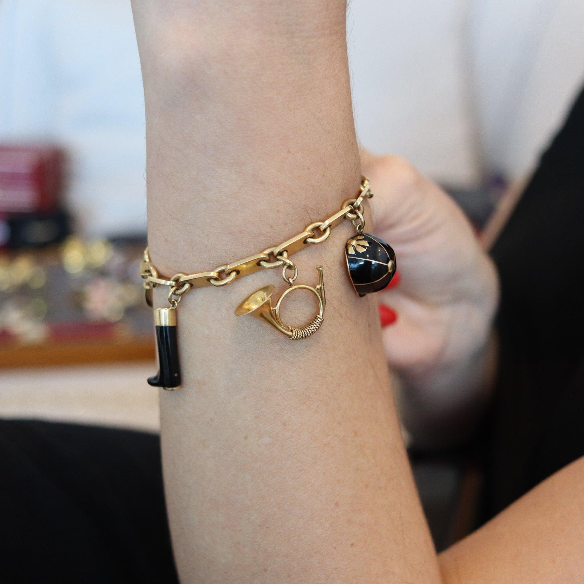 Charms bracelet designed by Georges L'Enfant for Hermes Paris.

This is a very rare equestrian motifs charms bracelet, created in Paris France at the jewelry atelier of Georges L'Enfant for the luxury house of Hermes, back in the 1970. This