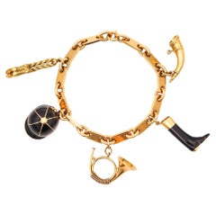 HERMES Paris 1970 By Georges L'Enfant Five-Charms Bracelet riche en or jaune 18Kt