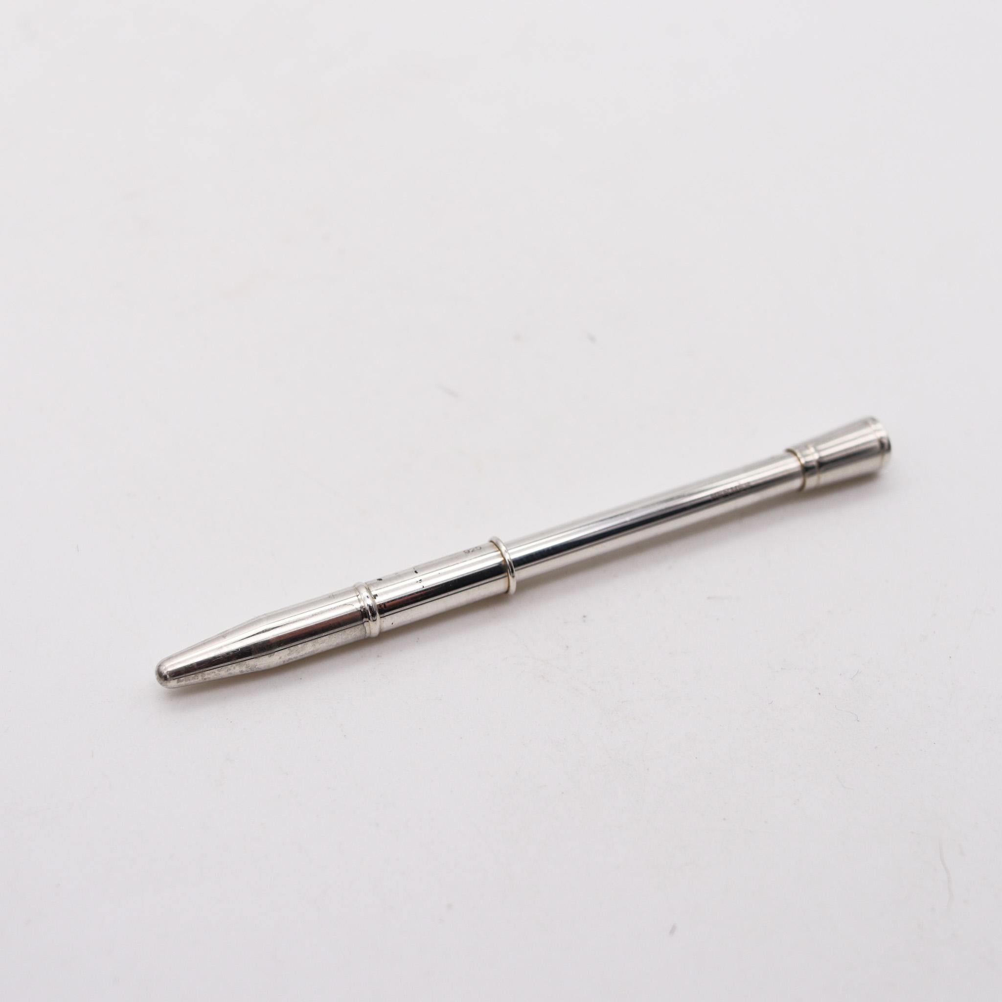 A purse pen designed by Hermes.

Very sleek and useful purse pen, created in Paris France by the luxury house of Hermes, back in the 1970. It was crafted with slim modernist geometric patterns in solid .925/.999 sterling silver with high polished