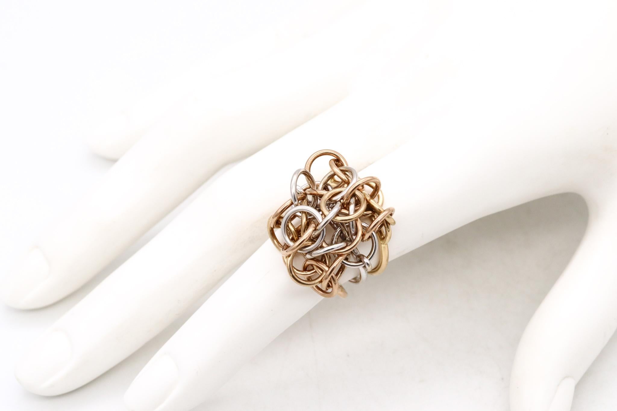 Rare kinetic ring designed by Hermes.

A vintage geometric ring made in Paris France around the 1980's. It was crafted by the house of Hermes in solid 18 karats of yellow and white gold.

This kinetic design, is composed by three rings with multiple