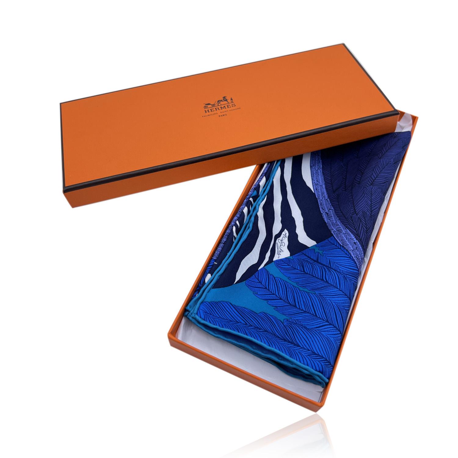  HERMES silk pocket square/neck scarf named 'Zebra Pegasus'. Designed by Alice Shirley. Blue colourway. Hand rolled edges. Made in France. Composition: 100%% silk. Measurements: 16.5 x 16.5 inches - 41.9 x 41.9 cm. 'Hermes-Paris' and 'Hermes' with