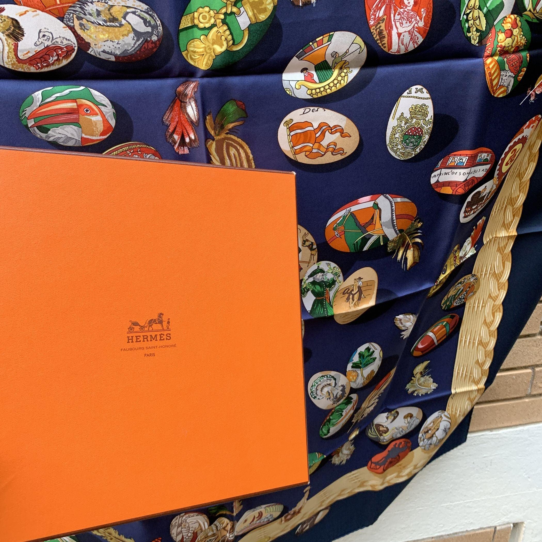 Hermes Paris 'Couvee d'Hermes ' Silk Scarf. It depicts many Easter eggs and on each eggs there are extracts from numerous Hermès scarves. Artist :Caty Latham. Year(s) of issue: 1994. Composition tag is still attached. Fabric / Material: 100% Silk.