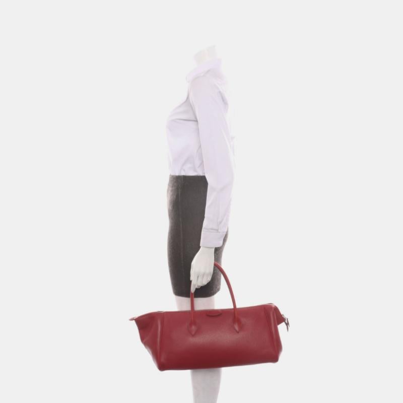 Hermes Paris Bombay 40 Red Clemence Calfskin Leather 2007
 These are professional photos of the actual bag.
 CONDITION: VERY GOOD 
 This preloved bag is in very good condition with light signs of use throughout. Light scuffs around the bottom, and