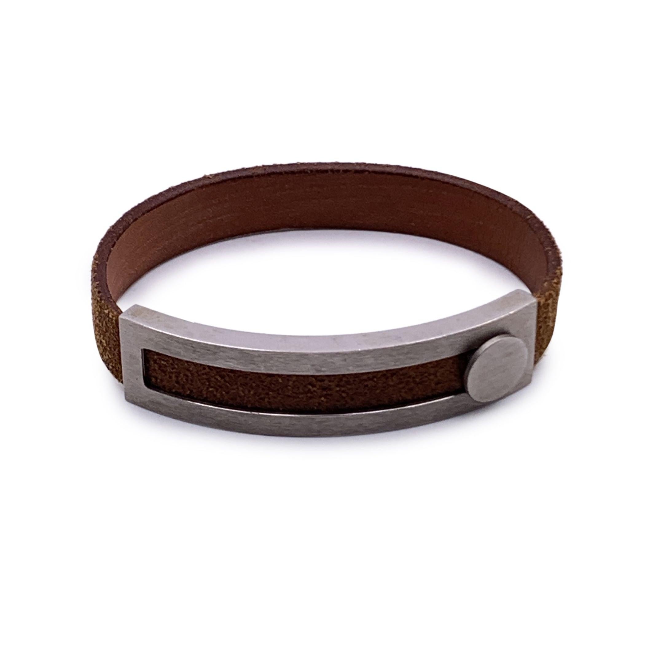Introducing the Hermès Tan Leather Pousse Pousse Bracelet, a sleek and sophisticated accessory that embodies the brand's signature luxury and craftsmanship. Crafted from high-quality tan leather, this bracelet is both understated and elegant, making