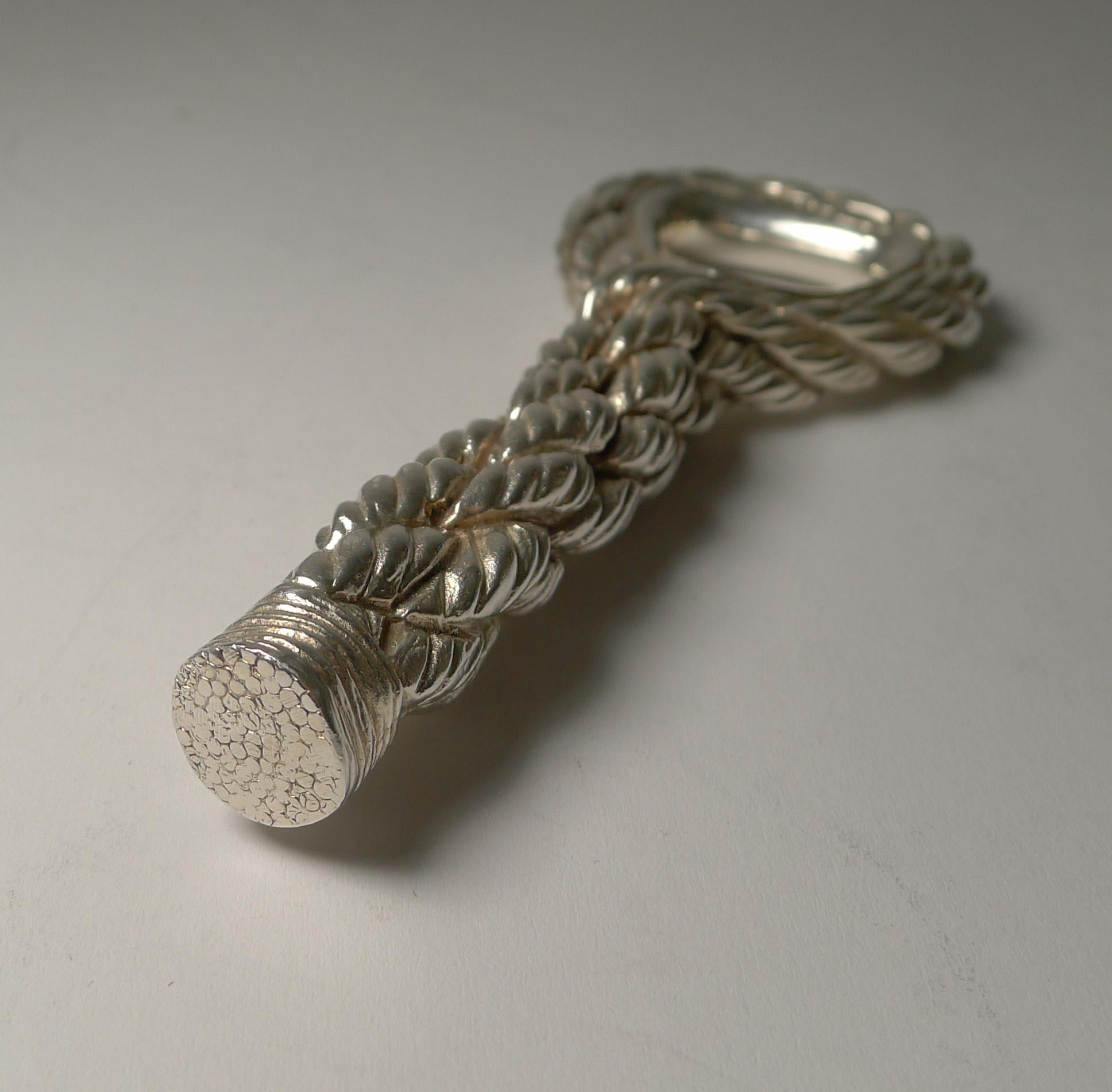 A fabulous vintage French silver plated bottle opener created c.1960's for the 