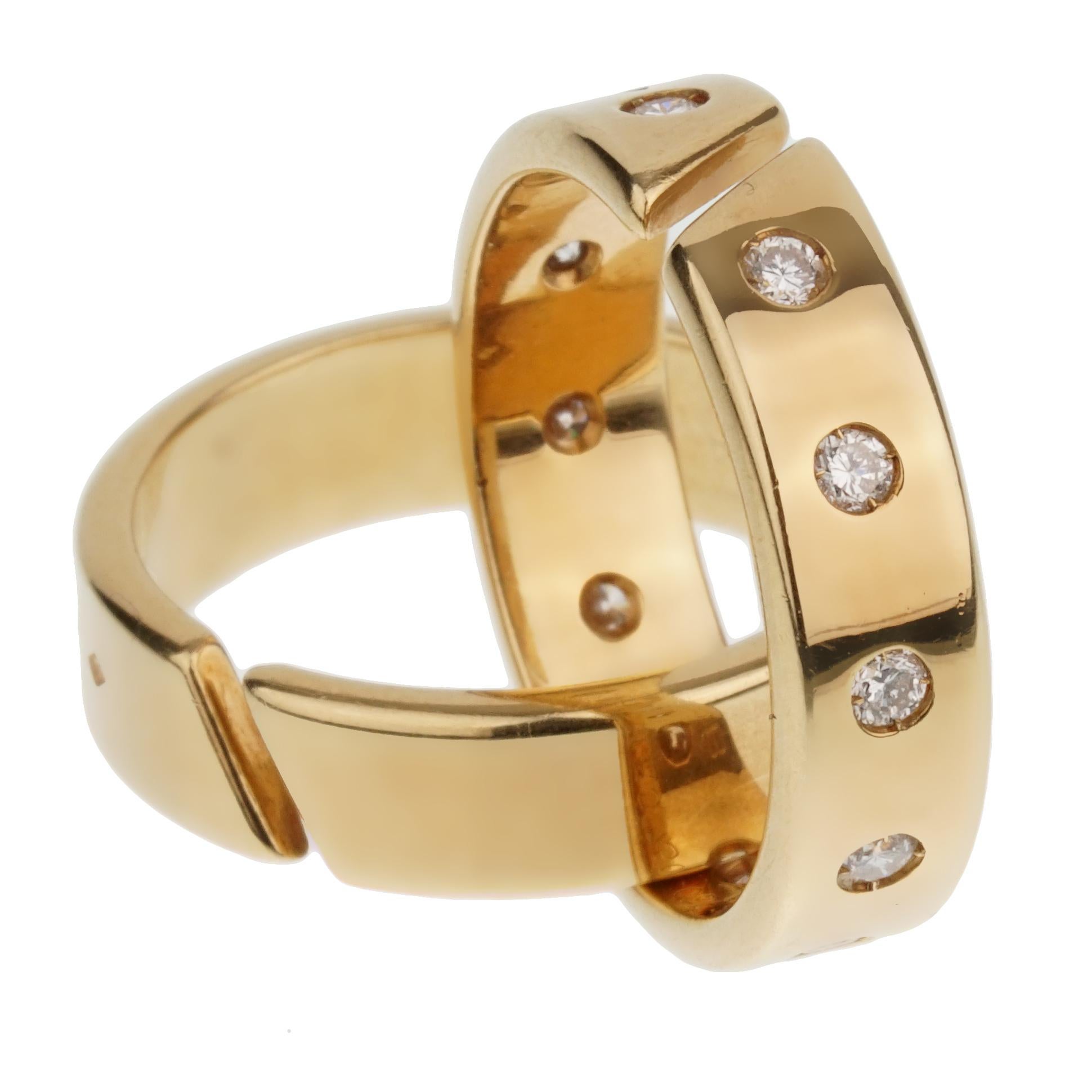Ein fabelhafter Hermes Rolling Ring mit 1 Band, besetzt mit original Hermes Diamanten im runden Brillantschliff, verflochten mit einem schlichten Band. Jedes Band ist vollständig gestempelt die Ringe misst eine Größe 51 eu.